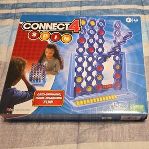 Hasbro Connect 4 Spin with Yellow and Red Discs